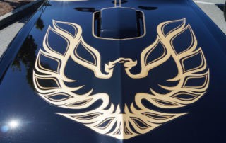 Gold Pontiac Firebird Logo